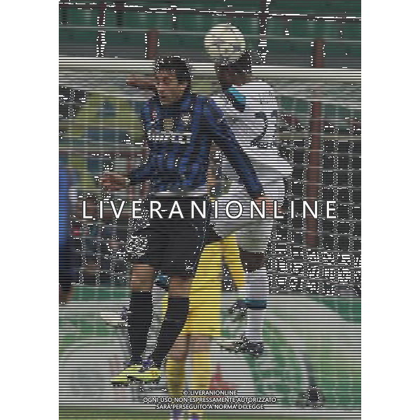 INTER - LILLE CHAMPIONS LEAGUE RITORNO 02/11/2011 NELLA FOTO: DIEGO MILITO E CHEDJOU ©SOLI / AGENZIA ALDO LIVERANI SAS