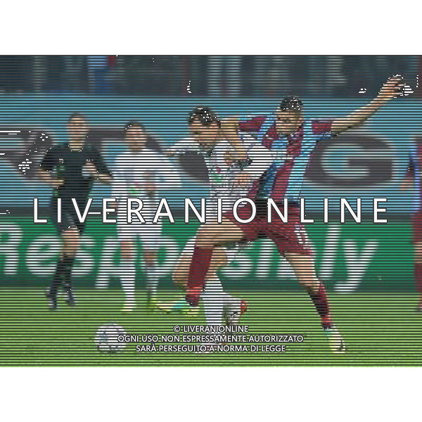 UEFA Champions League Group B soccer match between Trabzonspor and CSKA Moscow at Avni Aker stadium in Trabzon,Turkey, November 02, 2011. Pictured: Sergei Ignashevich (L) of CSKA Moscow and Burak Yilmaz (R) of Trabzonspor. PILKA NOZNA LIGA MISTRZOW SEZON 2011/2012 FOT.SESKIMPHOTO/NEWSPIX.PL POLAND, TURKEY, GERMANY, AUSTRIA AND UK OUT !!! --- Newspix.pl CHAMPIONS LEAGUE TRABZONSPOR CSKA MOSCA AG ALDO LIVERANI SAS ITALY ONLY *** Local Caption *** .