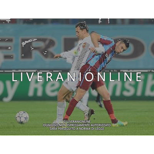 UEFA Champions League Group B soccer match between Trabzonspor and CSKA Moscow at Avni Aker stadium in Trabzon,Turkey, November 02, 2011. Pictured: Sergei Ignashevich (L) of CSKA Moscow and Burak Yilmaz (R) of Trabzonspor. PILKA NOZNA LIGA MISTRZOW SEZON 2011/2012 FOT.SESKIMPHOTO/NEWSPIX.PL POLAND, TURKEY, GERMANY, AUSTRIA AND UK OUT !!! --- Newspix.pl CHAMPIONS LEAGUE TRABZONSPOR CSKA MOSCA AG ALDO LIVERANI SAS ITALY ONLY *** Local Caption *** .