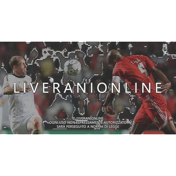 20111102: LISBON, PORTUGAL - Champions League 2011/2012 Group C: SL Benfica vs FC Basel. In picture: Luisao and Scott Chipperfield PHOTO: Alexandre Pona/CITYFILES liga mistrzow sezon 2011/2012 pilka nozna benfica lizbona VS fc basel bazylea FOT. CITYFILES/NEWSPIX.PL PORTUGAL,BRAZIL,SPAIN,GERMANY,FRANCE,UK OUT !!! --- Newspix.pl ITALY ONLY - CHAMPIONS LEAGUE BENFICA BASILEA - © ALDO LIVERANI *** Local Caption *** .