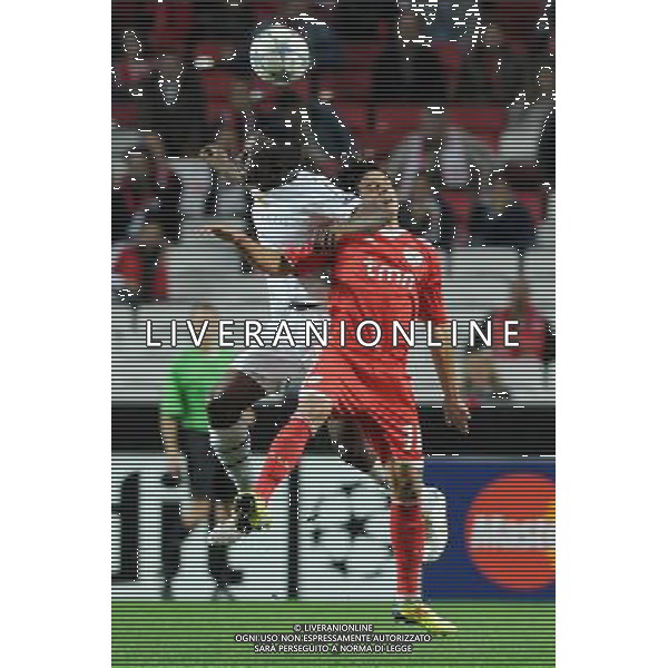 20111102: LISBON, PORTUGAL - Champions League 2011/2012 Group C: SL Benfica vs FC Basel. In picture: Jacques Zoua and Luis Martins PHOTO: Alexandre Pona/CITYFILES liga mistrzow sezon 2011/2012 pilka nozna benfica lizbona VS fc basel bazylea FOT. CITYFILES/NEWSPIX.PL PORTUGAL,BRAZIL,SPAIN,GERMANY,FRANCE,UK OUT !!! --- Newspix.pl ITALY ONLY - CHAMPIONS LEAGUE BENFICA BASILEA - © ALDO LIVERANI *** Local Caption *** .
