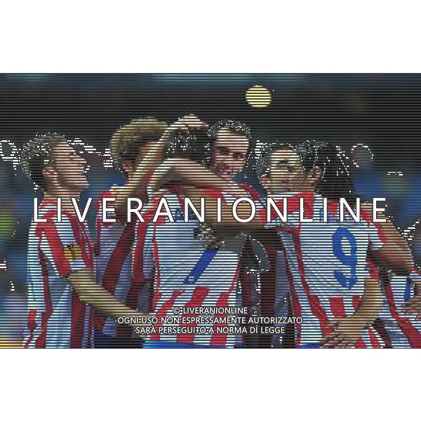(111104) -- MADRID, Nov. 4, 2011 () -- Atletico Madrid\'s players celebrate a score during the UEFA Europa League group I match against Udinese of Italy in Madrid, capital of Spain, on Nov. 3, 2011. Madrid won 4-0. (/Chen Haitong)(kh) ATLETICO MADRID - UDINESE ©AG ALDO LIVERANI SAS *** Local Caption *** .
