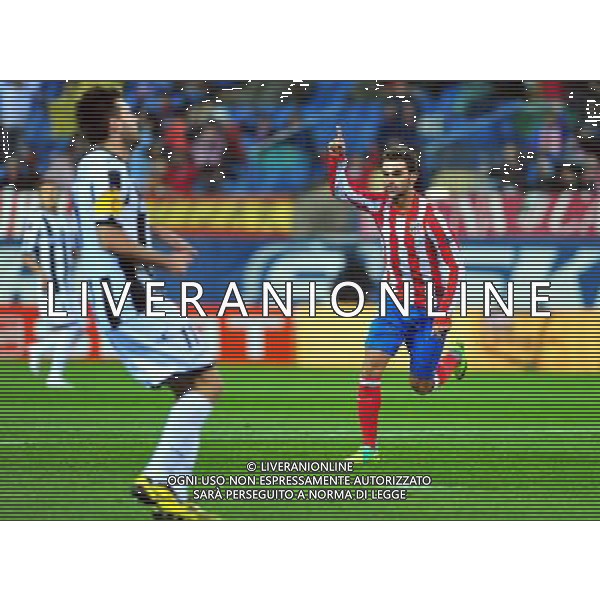 (111104) -- MADRID, Nov. 4, 2011 () -- Atletico Madrid\'s Adrian Lopez (R) celebrates after scoring during the UEFA Europa League group I match against Udinese of Italy in Madrid, capital of Spain, on Nov. 3, 2011. Madrid won 4-0. (/Chen Haitong)(kh) ATLETICO MADRID - UDINESE ©AG ALDO LIVERANI SAS *** Local Caption *** .