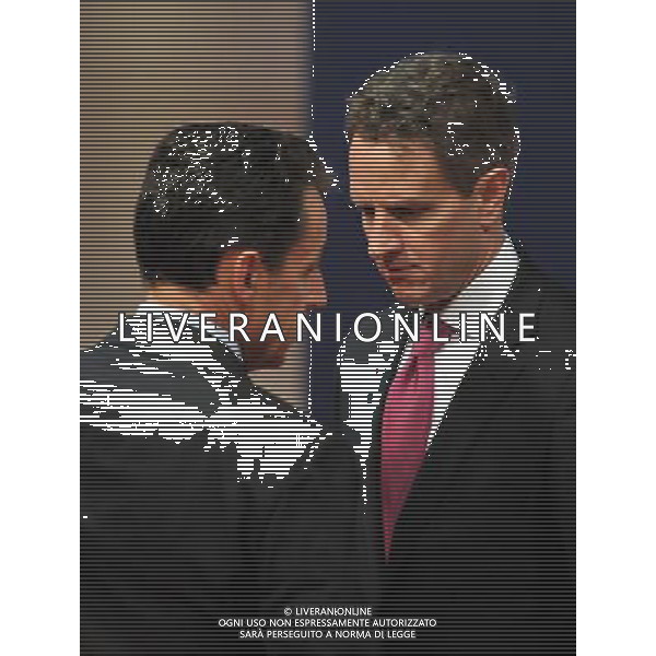 (111104) -- CANNES, NOV. 4, 2011 () -- French President Nicolas Sarkozy (L) talks with US Secretary of the Treasury Timothy Geithner during a commemorative photograph call after the signing of the Convention on Fighting Tax Evasion at the G20 Summit in Cannes, South France, Nov. 4, 2011. (/Wu Wei)(msq) CANNES - IL G20 ©ag ALDO LIVERANI SAS - ITALY ONLY - *** Local Caption *** .