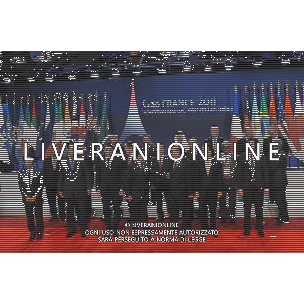 (111104) -- CANNES, NOV. 4, 2011 () -- French President Nicolas Sarkozy (4th L, front row), Chinese Finance Minister Xie Xuren (4th R, 2nd row), Secretary General of the Organization for Economic Co-operation and Development (OECD) Angel Gurria (5th L, front row) and finance ministers from G20 attend a commemorative photograph after the signing of the Convention on Fighting Tax Evasion during the G20 Summit in Cannes, South France, Nov. 4, 2011. (/Wu Wei)(msq) CANNES - IL G20 ©ag ALDO LIVERANI SAS - ITALY ONLY - *** Local Caption *** .