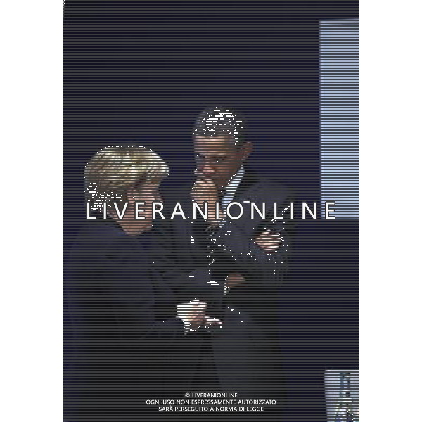 (111104) -- CANNES, Nov. 4, 2011 () -- German Chancellor Angela Merkel (L) talks with U.S. President Barack Obama prior to a meeting on the sencond day of the Group of Twenty (G20) summit in Cannes, France, Nov. 4, 2011. (/Lan Hongguang) (zgp) CANNES - IL G20 ©ag ALDO LIVERANI SAS - ITALY ONLY - *** Local Caption *** .