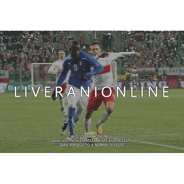 11.11.2011 WROCLAW , POLSKA , STADION NA MASLICACH , PILKA NOZNA , MECZ TOWARZYSKI POLSKA - WLOCHY , POLAND , STADIUM IN MASLICE , FOOTBALL , FRIENDLY GAME BETWEEN POLAND - ITALY N/Z: (L) MARIO BALOTELLI (ITA) , (P) ADAM MATUSZCZYK (POL) FOT: JAKUB PIASECKI/CYFRASPORT / NEWSPIX.PL --- Newspix.pl AMICHEVOLE CALCIO POLONIA ITALIA ©AGENZIA ALDO LIVERANI SAS - ITALY ONLY - *** Local Caption *** .