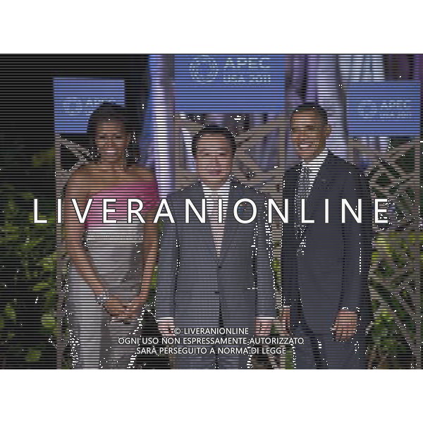 (111112) -- HONOLULU, Nov. 12, 2011 () -- U.S. President Barack Obama (1st R) and First Lady Michelle Obama (1st L) greet Japanese Prime Minister Yoshihiko Noda for APEC Leaders\' Dinner in Honolulu, Hawaii, the United States, Nov. 12, 2011. (/Zhang Jun) (qs) ©photoshot/Agenzia Aldo Liverani Sas - ITALY ONLY - Assemblea dei leaders economici dell\'APEC a Honolulu, Stati Uniti, 12 novembre 2011.