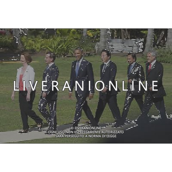 (111114) -- HONOLULU, Nov. 14, 2011 () -- (From L-R) Australian Prime Minister Julia Gillard, Russian President Dmitry Medvedev, U.S. President Barack Obama, Japanese Prime Minister Yoshihiko Noda, Brunei\'s Sultan Hassanal Bolkiah and Chile\'s President Sebastian Pinera make their way to the podium for the group photo picturing during the 19th Asia-Pacific Economic Cooperation (APEC) Informal Leadership Meeting in Honolulu, Hawaii, the U.S., on Nov. 13, 2011. (/Zhang Jun)(ctt) ©photoshot/Agenzia Aldo Liverani Sas - ITALY ONLY - 19ma Assemblea dei leaders economici dell\'APEC (Asia-Pacific Economic Cooperation) a Honolulu , Hawaii, Stati Uniti, 13 novembre 2011. 
