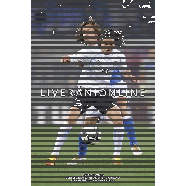 Roma - 15/11/2011 - Stadio Olimpico - Amichevole Nazionale Italiana - Italia vs Uruguay - nella foto: edinson cavani e pirlo andrea å© Fabrizio Corradetti - Ag. Aldo Liverani sas