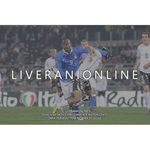 Roma - 15/11/2011 - Stadio Olimpico - Amichevole Nazionale Italiana - Italia vs Uruguay - nella foto: mario balotelli e pereira å© Fabrizio Corradetti - Ag. Aldo Liverani sas