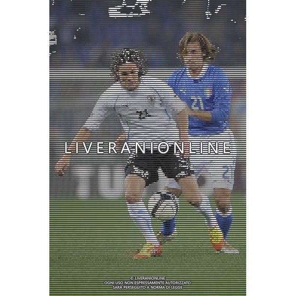 Roma - 15/11/2011 - Stadio Olimpico - Amichevole Nazionale Italiana - Italia vs Uruguay - nella foto: edinson Cavani e Pirlo andrea Œ© Fabrizio Corradetti - Ag. Aldo Liverani sas