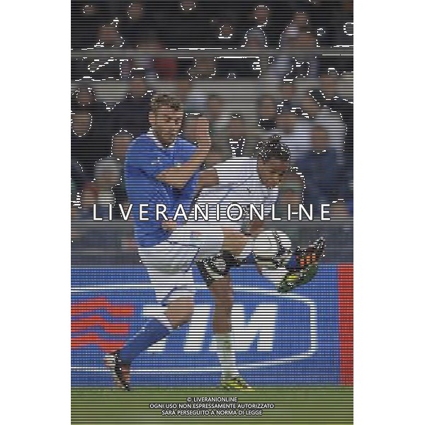 Roma - 15/11/2011 - Stadio Olimpico - Amichevole Nazionale Italiana - Italia vs Uruguay - nella foto: Daniele De Rossi e Alvaro Pereira å© Fabrizio Corradetti - Ag. Aldo Liverani sas