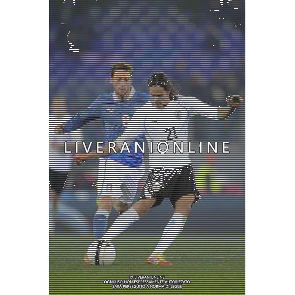 Roma - 15/11/2011 - Stadio Olimpico - Amichevole Nazionale Italiana - Italia vs Uruguay - nella foto: Cavani e Claudio Marchisio å© Fabrizio Corradetti - Ag. Aldo Liverani sas