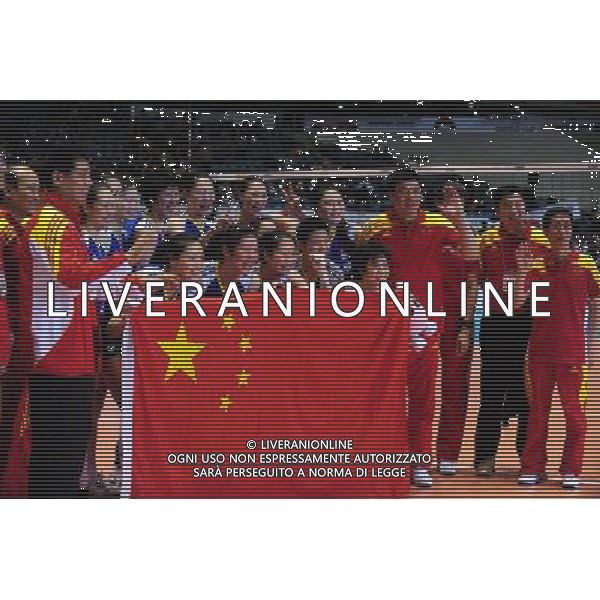(111118) -- TOKYO, Nov. 18, 2011 () -- Members of Chinese women\'s volleyball team pose for photos after beating Germany at the World Cup women\'s volleyball tournament in Tokyo, Japan, on Nov. 18, 2011. China beat Germany 3-0 here in their last match of the event and secured a London 2012 Olympic Games ticket, with the third ranking on the final World Cup Standing. (/Ji Chunpeng) (zc) - Xinhua/Photoshot - Ag. Aldo Liverani sas ITALY ONLY TOKIO - COPPA DEL MONDO DI VOLLEY ( PALLAVOLO) 2011: CINA vs GERMANIA