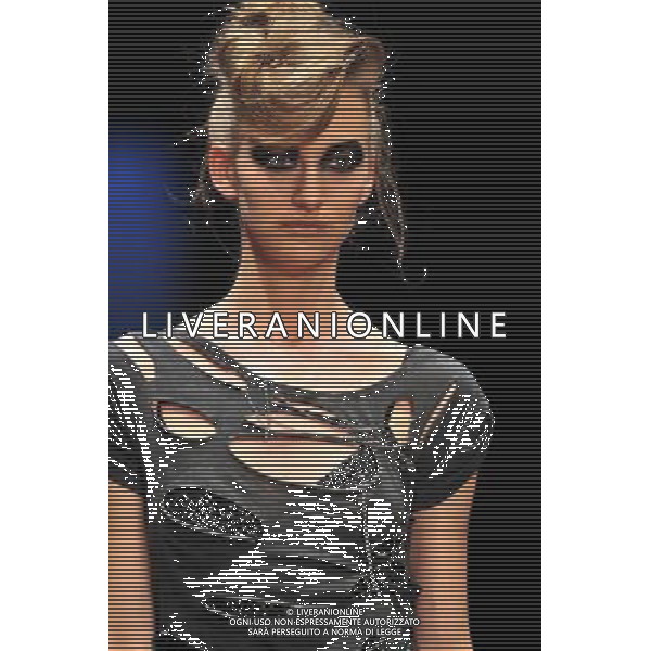 (111121) -- TEL AVIV, Nov. 21, 2011 () -- A model presents a creation of the brand Sugar Daddy during the first show of Tel Aviv Fashion Week in Tel Aviv, Israel, on Nov.21, 2011.(/Yin Dongxun)(wn) - Xinhua/Photoshot - AG. ALDO LIVERANI SAS ITALY ONLY ISRAELE - SETTIMANA DELLA MODA A TEL AVIV.