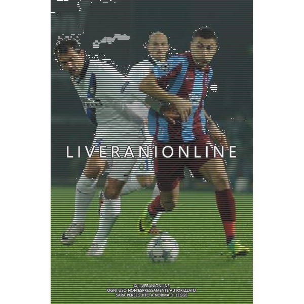 UEFA Champions League Group B soccer match between Trabzonspor and Inter Milan at Avni Aker stadium in Trabzon, Turkey, 22.11.2011. Match Scored : Trabzonspor 1 - Inter 1 Pictured:Burak Yilmaz ( back ) of Trabzonspor and Dejan Stankovic of Inter. PILKA NOZNA LIGA MISTRZOW SEZON 2011/2012 TRABZONSPORT - INTER MEDIOLAN FOT.SESKIMPHOTO/NEWSPIX.PL TURKEY, GERMANY, AUSTRIA AND UK OUT !!! --- Newspix.pl /AG ALDO LIVERANI SAS CHAMPIONS LEAGUE TRABZONSPOR - INTER - ITALY ONLY - *** Local Caption *** .