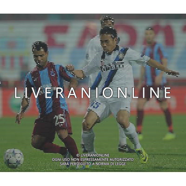 UEFA Champions League Group B soccer match between Trabzonspor and Inter Milan at Avni Aker stadium in Trabzon, Turkey, 22.11.2011. Match Scored : Trabzonspor 1 - Inter 1 Pictured:Alanzinho (L) of Trabzonspor and Yuto Nagatomo of Inter. PILKA NOZNA LIGA MISTRZOW SEZON 2011/2012 TRABZONSPORT - INTER MEDIOLAN FOT.SESKIMPHOTO/NEWSPIX.PL TURKEY, GERMANY, AUSTRIA AND UK OUT !!! --- Newspix.pl /AG ALDO LIVERANI SAS CHAMPIONS LEAGUE TRABZONSPOR - INTER - ITALY ONLY - *** Local Caption *** .