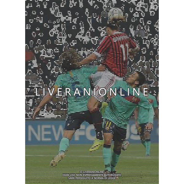 UEFA Champions League 2011/2012 Gruppo H Milano - 23.11.2011 Milan-Barcellona Nella Foto:ibrahimovic fra puyol e thiago alcantara /Ph.Vitez-Ag. Aldo Liverani