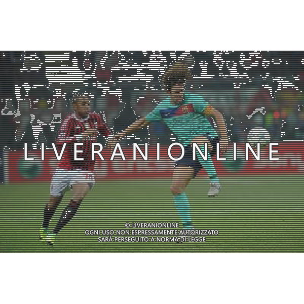 UEFA Champions League - Fase a Gironi 5ç giornata Gruppo H Milano 23-11-2011 Milan - Barcellona nella foto: Puyol anticipa Robinho foto Roberto Garavaglia - ag. Aldo Liverani sas