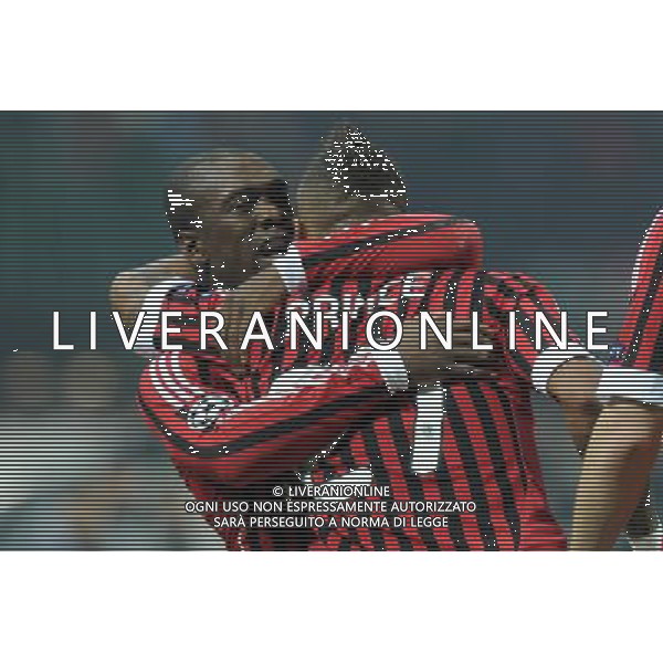 UEFA Champions League - Fase a Gironi 5Á giornata Gruppo H Milano 23-11-2011 Milan - Barcellona nella foto: Clarence Seedorf (Milan) abbraccia Kevin Prince Boateng (Milan) foto Roberto Garavaglia - ag. Aldo Liverani sas