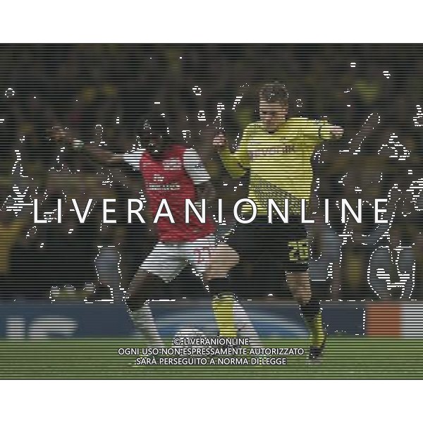 Borussia Dortmund\'s Lukasz Piszczek battles with Arsenal\'s Kouassi Gervais \'Gervinho\' Yao Football - UEFA Champions League - Group F - Arsenal London v Borussia Dortmund - Wed 23 Nov 2011 - Emirates Stadium - London - UK Foto: Michal Zemanek / Newspix.pl --- Newspix.pl AG ALDO LIVERANI S A S ONLY ITALY *** Local Caption *** www.newspix.pl mail us: info@newspix.pl call us: 0048 022 23 22 222 --- Polish Picture Agency by Ringier Axel Springer Poland