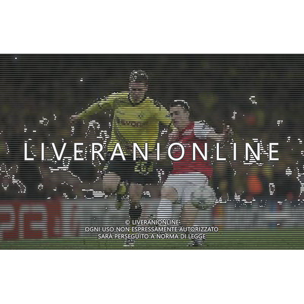 Borussia Dortmund\'s Lukasz Piszczek battles with Arsenal\'s Laurent Koscielny Football - UEFA Champions League - Group F - Arsenal London v Borussia Dortmund - Wed 23 Nov 2011 - Emirates Stadium - London - UK Foto: Michal Zemanek / Newspix.pl --- Newspix.pl AG ALDO LIVERANI S A S ONLY ITALY *** Local Caption *** www.newspix.pl mail us: info@newspix.pl call us: 0048 022 23 22 222 --- Polish Picture Agency by Ringier Axel Springer Poland