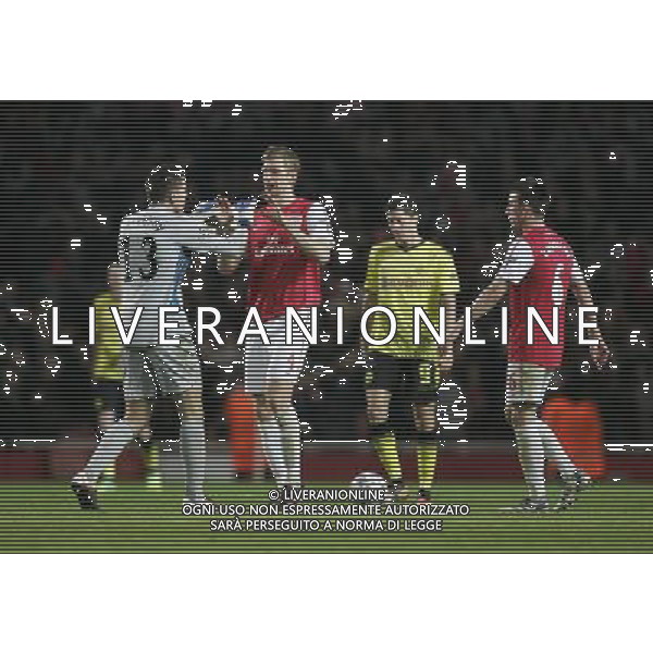 Arsenal\'s Wojciech Szczesny celebrates Robin van Persie goal with Per Mertesacker while Borussia Dortmund\'s Robert Lewandowski looks dejected Football - UEFA Champions League - Group F - Arsenal London v Borussia Dortmund - Wed 23 Nov 2011 - Emirates Stadium - London - UK Foto: Michal Zemanek / Newspix.pl --- Newspix.pl AG ALDO LIVERANI S A S ONLY ITALY *** Local Caption *** www.newspix.pl mail us: info@newspix.pl call us: 0048 022 23 22 222 --- Polish Picture Agency by Ringier Axel Springer Poland