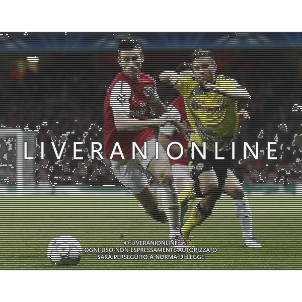Borussia Dortmund\'s Moritz Leitner is fouled by Arsenal\'s Laurent Koscielny Football - UEFA Champions League - Group F - Arsenal London v Borussia Dortmund - Wed 23 Nov 2011 - Emirates Stadium - London - UK Foto: Michal Zemanek / Newspix.pl --- Newspix.pl AG ALDO LIVERANI S A S ONLY ITALY *** Local Caption *** www.newspix.pl mail us: info@newspix.pl call us: 0048 022 23 22 222 --- Polish Picture Agency by Ringier Axel Springer Poland