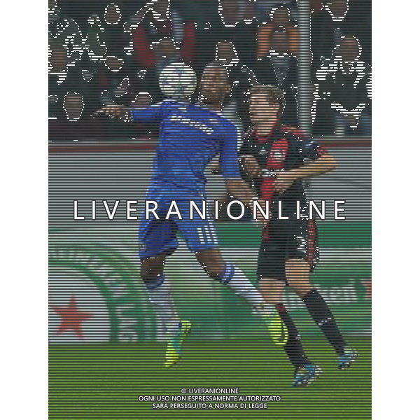 (111124) -- LEVERKUSEN, Nov. 24, 2011 () -- Daniel Schwaab (R) of Bayer 04 Leverkusen vies with Didier Drogba of Chelsea FC during the UEFA Champions League Group E match at Bay Arena in Leverkusen, Germany, Nov. 23, 2011. Bayer 04 Leverkusen won the match 2-1. (/Ma Ning) AG ALDO LIVERANI S A S ONLY ITALY