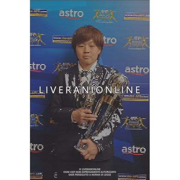 (111123) -- KUALA LUMPUR, Nov. 23, 2011 () -- AFC Woman Player of the Year 2011 Aya Miyama of Japan holds her trophies during the AFC Annual Awards 2011 in Kuala Lumpur, Malaysia, Nov. 23, 2011. (/Chong Voon Chung) (jyc) AG ALDO LIVERANI S A S ONLY ITALY