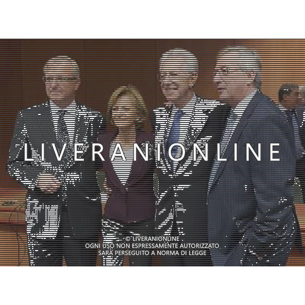 (111129) -- BRUSSELS, Nov. 29, 2011 () -- EU Commissioner for Economic and Monetary affairs Olli Rehn(1st, L), Spanish Finance Minister Elena Salgado(2nd, L), Italian Prime Minister and Finance Minister Mario Monti(2nd, R) and Luxembourg\'s Prime Minister and president of the Eurogroup Jean-Claude Juncker pose for a photo during a eurozone finance ministers meeting at the EU headquarters in Brussels, capital of Belgium, Nov. 29, 2011. (/Thierry Monasse) - Xinhua/Photoshot - Ag. Aldo Liverani sas ITALY ONLY BRUXELLES - MEETING DEI MINISTRI DELLA FINANZA DELL\'EUROZONE