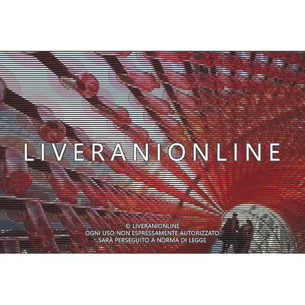 (111130) -- PARIS, Nov. 30, 2011 () -- Visitors watch the exhibition \'Sounds of my life\' by Ireland\'s artist Bryan McCormack at the Georges Pompidou art center in Paris, France, on Nov. 30, 2011. The exhibition shows coloured plastic condoms at all floors of Georges Pompidou Center as part of a campaign to fight against AIDS. (/Gao Jing) - Xinhua/Photoshot - Ag.Aldo Liverani sas ITALY ONLY PARIGI - CENTRE GEORGES POMPIDOU: MOSTRA DELL\'ARTISTA IRLANDESE BRYAN McCORMACK, RAFFIGURA PROFILATTICI COLORATI COME CAMPAGNA PER LA LOTTA CONTRO L\'AIDS.