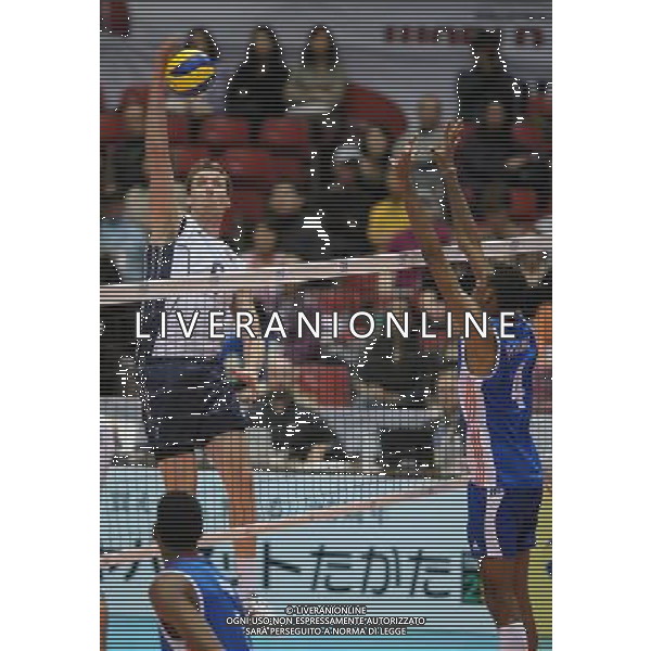 (111203) -- TOKYO , Dec. 3, 2011 () -- Ryan Millar (L) of the United States spikes the ball during the match against Cuba at the FIVB Men\'s World Cup in Tokyo, Japan, Dec 3, 2011. United States won 3-2. (/Kenichiro Seki) (jyc) ©photoshot/Agenzia Aldo Liverani Sas - ITALY ONLY - Stati Uniti vs Cuba Pallavolo Coppa del Mondo maschile Volley FIVB di Tokyo, in Giappone, 3 dicembre 2011.