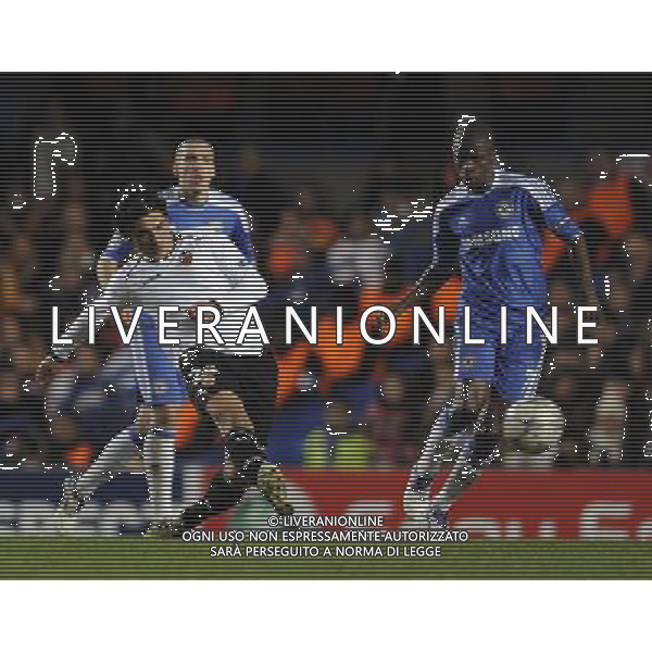 (101207) -- LONDON, Dec. 7, 2011 () -- Tino Costa (L) of Valencia passes the ball during the match against Chelsea in 2011/12 UEFA Champions League, in London, Britain, Dec. 6, 2011. Chelsea won 3-0 to ensure its place in the last 16 for the ninth successive year. (/Zeng Yi) AG ALDO LIVERANI S A S ONLY ITALY