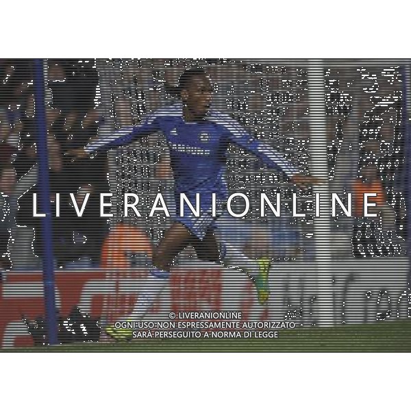 (101207) -- LONDON, Dec. 7, 2011 () -- Didier Drogba of Chelsea celebrates for his second goal during the home match against Valencia in 2011/12 UEFA Champions League, in London, Britain, Dec. 6, 2011. Chelsea won 3-0 to ensure its place in the last 16 for the ninth successive year. (/Zeng Yi) AG ALDO LIVERANI S A S ONLY ITALY