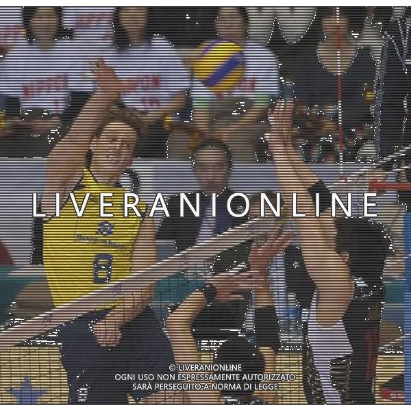 (111204) -- TOKYO, Dec. 4, 2011 () -- Murilo Endres (L) of Brazil spikes the ball during the match against Japan at the FIVB Men\'s World Cup in Tokyo, Japan, Dec 4, 2011. Brazil won 3-0. (/Kenichiro Seki) (jyc) ©photoshot/Agenzia Aldo Liverani Sas - ITALY ONLY - Cerimonia di premiazione Pallavolo Coppa del Mondo maschile Volley FIVB di Tokyo, in Giappone , 4 Dicembre 2011.