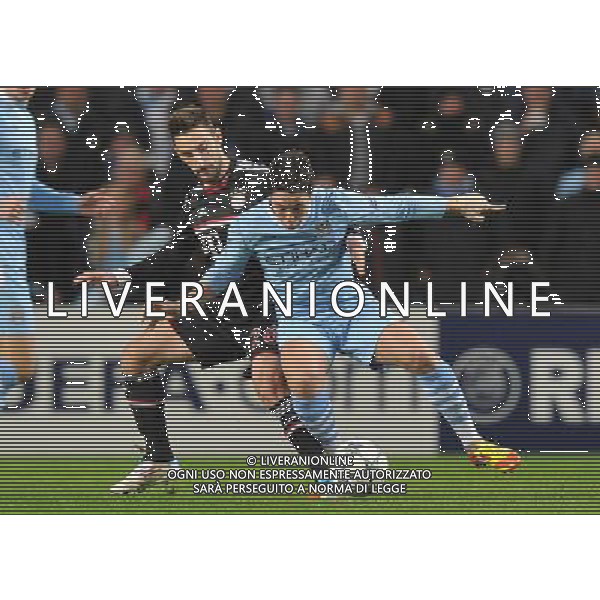 Manchester City\'s Samir Nasri is tackled by Bayern Munich\'s Diego Contento Football - UEFA Champions League Group A - Manchester City v Bayern Munich - Wed 07 Dec 2011 - Etihad Stadium - Manchester Œ© CameraSport - 43 Linden Ave. Countesthorpe. Leicester. England. LE8 5PG - Tel: +44 (0) 116 277 4147 - admin@camerasport.com - www.camerasport.com ©AG ALDO LIVERANI SAS - ITALY ONLY *** Local Caption *** .