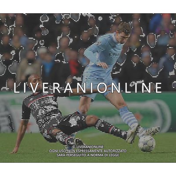 Manchester City\'s Edin Dzeko is tackled by Bayern Munich\'s Jerome Boateng Football - UEFA Champions League Group A - Manchester City v Bayern Munich - Wed 07 Dec 2011 - Etihad Stadium - Manchester Œ© CameraSport - 43 Linden Ave. Countesthorpe. Leicester. England. LE8 5PG - Tel: +44 (0) 116 277 4147 - admin@camerasport.com - www.camerasport.com ©AG ALDO LIVERANI SAS - ITALY ONLY *** Local Caption *** .