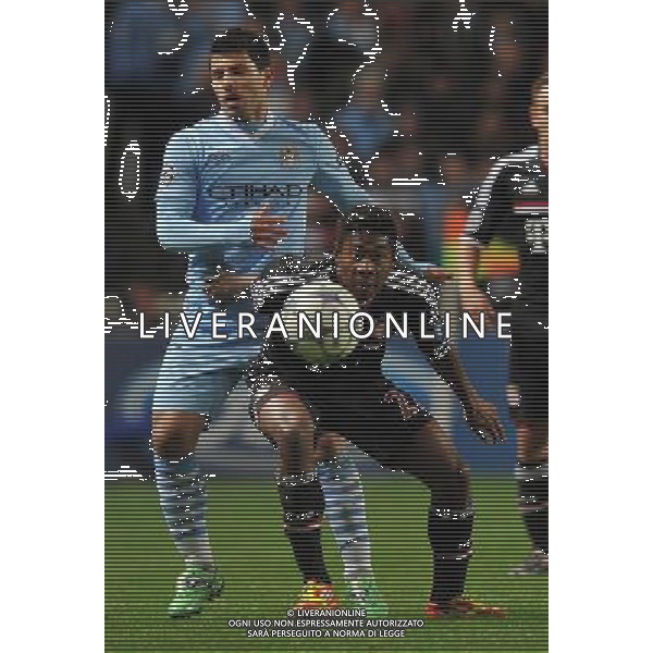 Bayern Munich\'s David Alaba beets Manchester City\'s Sergio Aguero to the ball Football - UEFA Champions League Group A - Manchester City v Bayern Munich - Wed 07 Dec 2011 - Etihad Stadium - Manchester Œ© CameraSport - 43 Linden Ave. Countesthorpe. Leicester. England. LE8 5PG - Tel: +44 (0) 116 277 4147 - admin@camerasport.com - www.camerasport.com ©AG ALDO LIVERANI SAS - ITALY ONLY *** Local Caption *** .