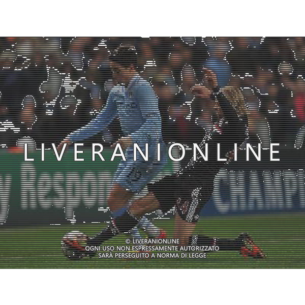 Manchester City\'s Samir Nasri is tackled by Bayern Munich\'s Anatoliy Tymoshchuk Football - UEFA Champions League Group A - Manchester City v Bayern Munich - Wed 07 Dec 2011 - Etihad Stadium - Manchester Œ© CameraSport - 43 Linden Ave. Countesthorpe. Leicester. England. LE8 5PG - Tel: +44 (0) 116 277 4147 - admin@camerasport.com - www.camerasport.com ©AG ALDO LIVERANI SAS - ITALY ONLY *** Local Caption *** .