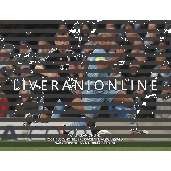 Manchester City\'s Vincent Kompany and Bayern Munich\'s Ivica Olic battle for the ball Football - UEFA Champions League Group A - Manchester City v Bayern Munich - Wed 07 Dec 2011 - Etihad Stadium - Manchester Œ© CameraSport - 43 Linden Ave. Countesthorpe. Leicester. England. LE8 5PG - Tel: +44 (0) 116 277 4147 - admin@camerasport.com - www.camerasport.com ©AG ALDO LIVERANI SAS - ITALY ONLY *** Local Caption *** .