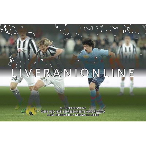 Coppa Italia TIM - Ottavi di finale Torino 8-12-2011 Juventus - Bologna nella foto: Krasic e Gimenez foto Roberto Garavaglia - ag. Aldo Liverani sas