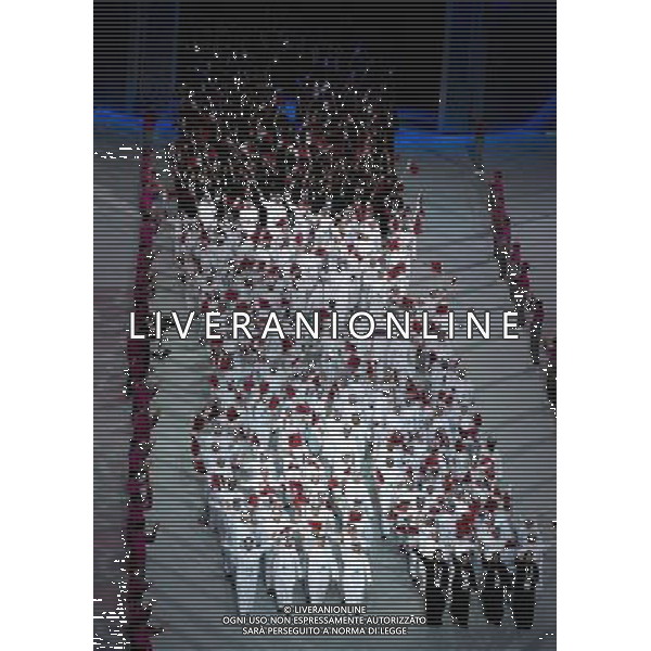 (111210) -- DOHA, Dec. 10, 2011 () -- The Qatari delegation take part in the opening ceremony of the 12th Arab Games in Doha, capital of Qatar, Dec. 9, 2011. (/Chen Shaojin) (lm) ©photoshot/Agenzia Aldo Liverani Sas - ITALY ONLY - cerimonia di apertura dei 12mi Giochi arabi al Khalifa Stadium a Doha, capitale del Qatar, 9 dicembre 2011.