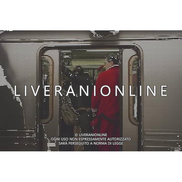 Christmas revelers participating in the annual Santacon travel on the subway in New York on Saturday, December 10, 2011. Santacon, primarily a pub crawl in Santa and other Christmas related costumes, attracts hundreds of masqueraders going from bar to bar. The drinkers were encouraged to imbibe at establishments which are participating in Toys For Tots and the NYPD reported that not a single Santa was arrested. (å Richard B. Levine) Photo via Newscom ©photoshot/AG ALDO LIVERANI SAS - ITALY ONLY