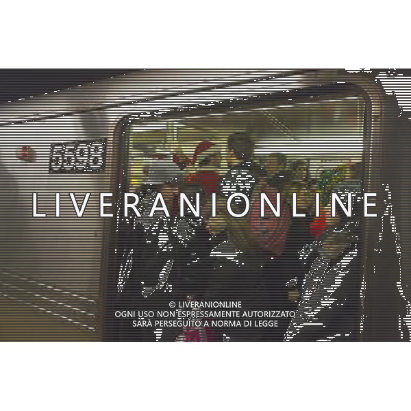 Christmas revelers participating in the annual Santacon travel on the subway in New York on Saturday, December 10, 2011. Santacon, primarily a pub crawl in Santa and other Christmas related costumes, attracts hundreds of masqueraders going from bar to bar. The drinkers were encouraged to imbibe at establishments which are participating in Toys For Tots and the NYPD reported that not a single Santa was arrested. (å Richard B. Levine) Photo via Newscom ©photoshot/AG ALDO LIVERANI SAS - ITALY ONLY