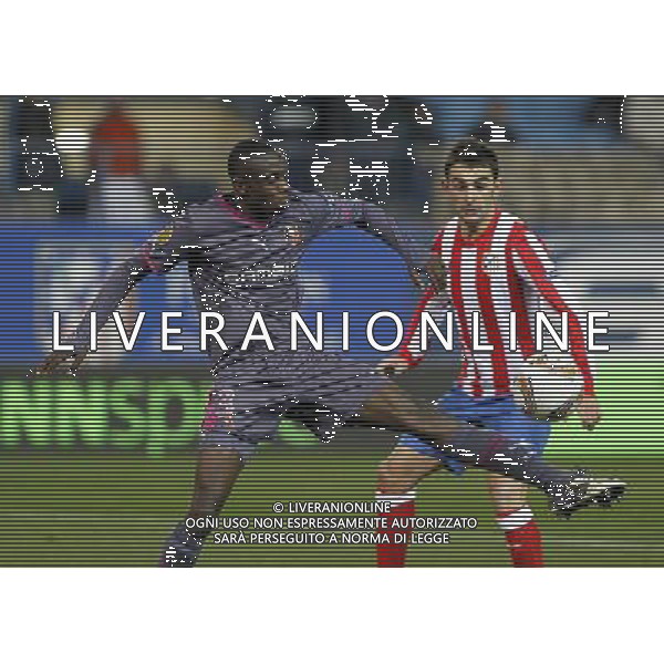 Atletico de Madrid\'s Adrian Lopez (r) and Stade Rennais\' Chris Mavinga during Europa League match.December 15,2011. (ALTERPHOTOS/Acero) EUROPA LEAGUE - ATLETICO MADRID RENNES ©AG ALDO LIVERANI SAS - ITALY ONLY