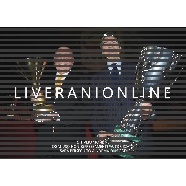 Assemblea Ordinaria Lega Calcio Serie A Desenzano del Garda (Brescia) - 19.12.2011 Nella Foto:braida e galliani con le coppe vinte dal milan /Ph.Vitez-Ag. Aldo Liverani