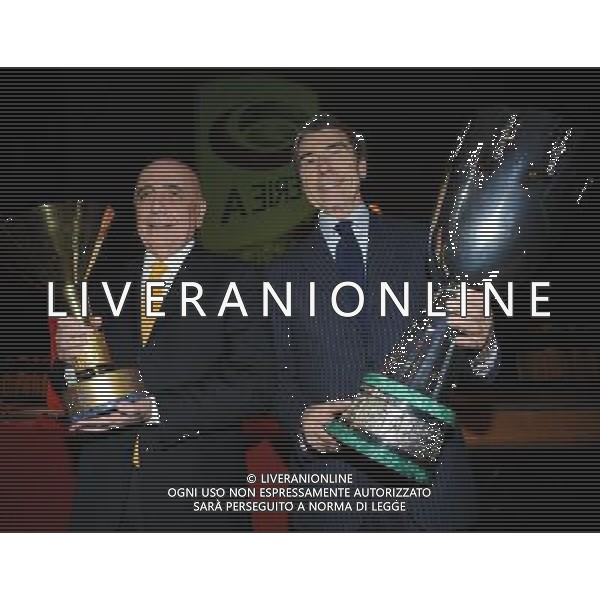 Assemblea Ordinaria Lega Calcio Serie A Desenzano del Garda (Brescia) - 19.12.2011 Nella Foto:braida e galliani con le coppe vinte dal milan /Ph.Vitez-Ag. Aldo Liverani