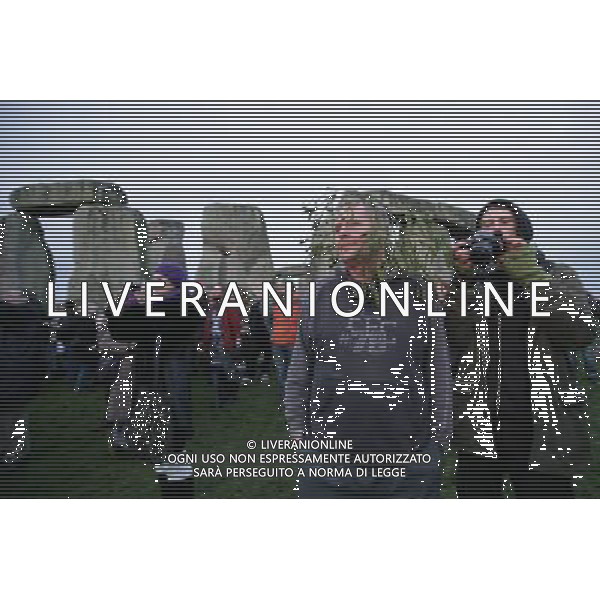 Winter Solstice celebrations with Pagans, Druids \' revellers at Stonehenge Historic site Amesbury Wiltshire England ©photoshot/Agenzia Aldo Liverani Sas - ITALY ONLY - Celebrazioni del Solstizio d\'inverno con i partecipanti in veste di Pagani, Druidi e festaioli al sito storico Amesbury Stonehenge Wiltshire in Inghilterra